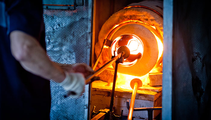 Glass blowing in a factory